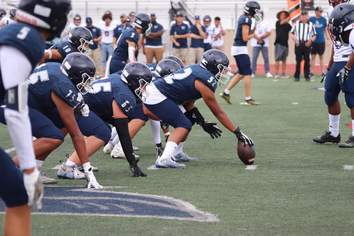 San Marcos High School varsity football team during a game.