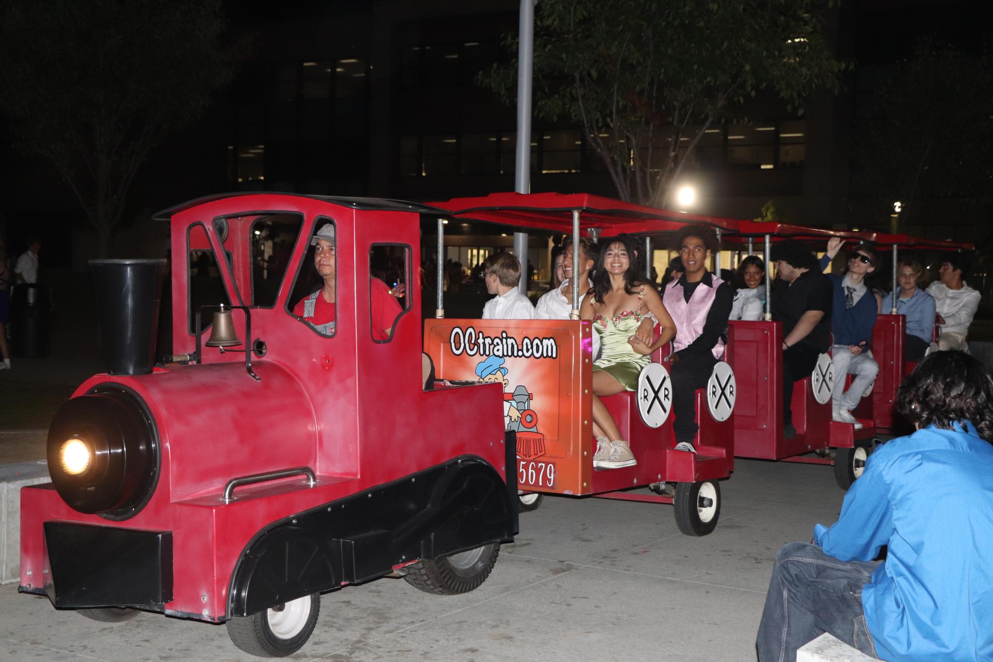 Students on a little train ride around campus on Oct. 7. during Homecoming.