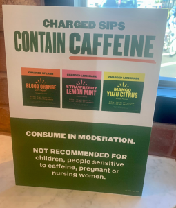 Photo captures "Charged sips contain caffeine" warning sign posted in local Panera, stating the audience that should stay away from the drink. (<a href="https://smhsknightsnews.com/staff_profile/rachel-weinberg/">Rachel Weinberg</a>)