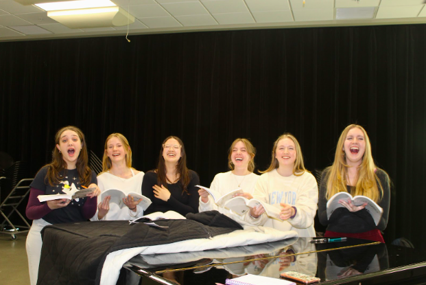 The+cast+of+The+Little+Mermaid%2C+rehearsing+the+Sister%E2%80%99s+opening+act.+Pictured+from+left+to+right%3A+Avery+Wease%2C+Megan+Orr%2C+Kennedy+Gardner%2C+Ashlee+Mcollough%2C+Dylan+Wagner%2C+and+Ella+Masalin.
